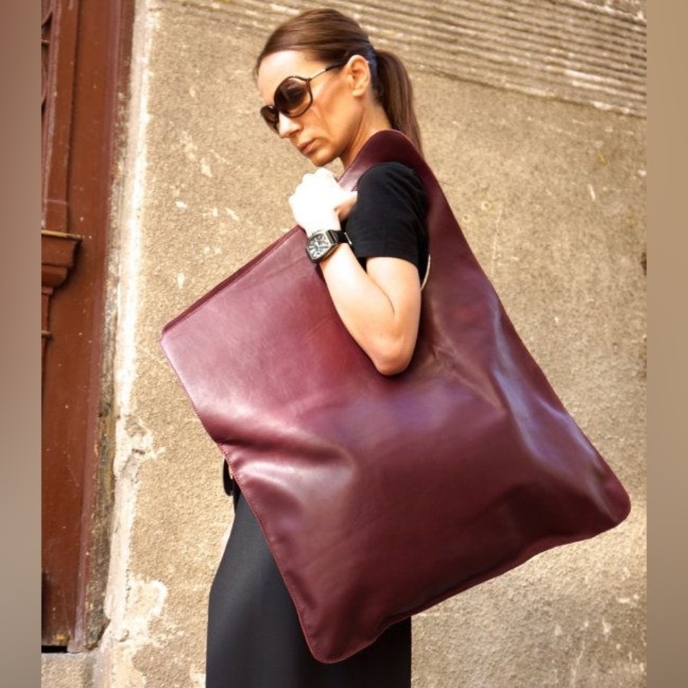 Like new! Asymmetrical large real leather hobo bag